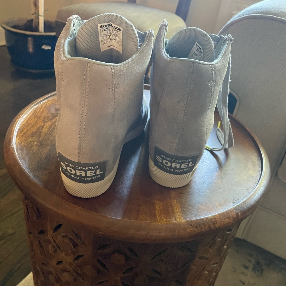 Never worn sorel sneaker boot all weather